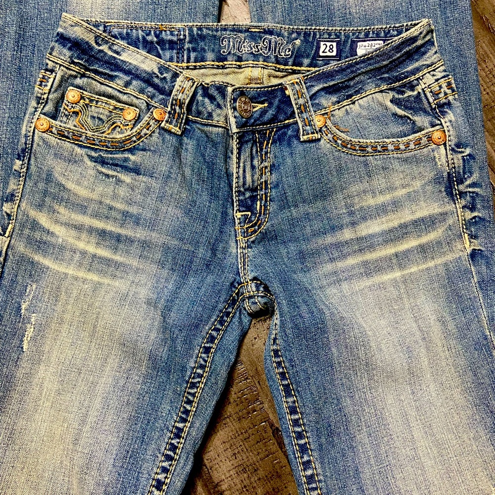 Miss me cow skin pockets boot cut jeans